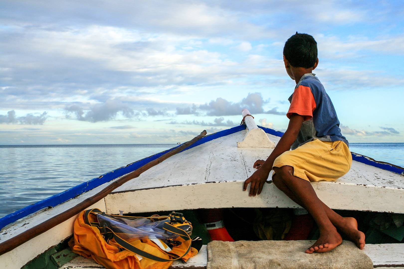 Enfant sur un bateau de pêche - Île Maurice