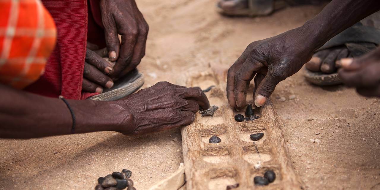 Hommes jouant au bao - Kenya